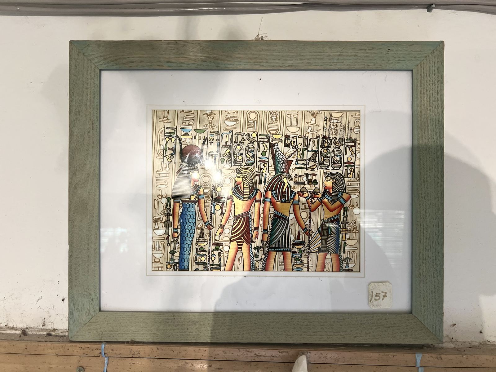 Reproduction encadrée d'une scène hiéroglyphique égyptienne